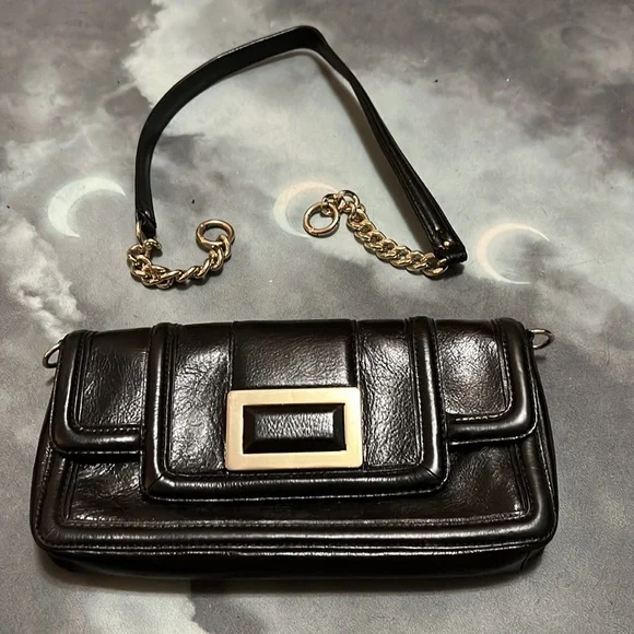 Sleek black faux leather Banana Republic purse with gold accents. - Picture 4 of 4